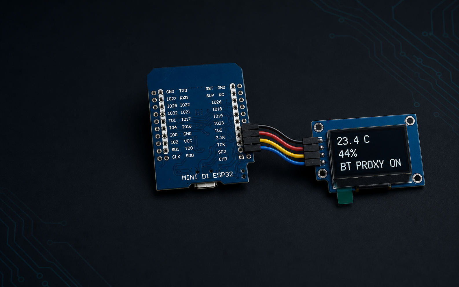 ESP32 board connected to an OLED showing temperature, humidity, and Bluetooth proxy status